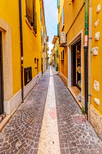 Street in city against sky