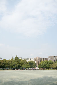 Buildings in city against sky