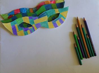 High angle view of multi colored pencils on table