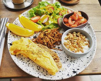 High angle view of breakfast served on table