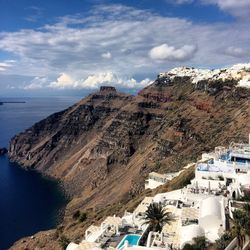 High angle view of houses on mountain by sea