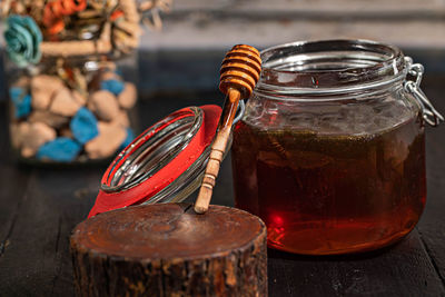 Close-up of glass jar on table