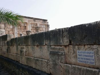 Low angle view of old building against sky