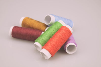 Close-up of colorful candies against white background