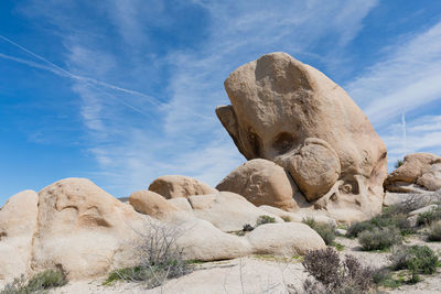 Statue of rock formations in desert