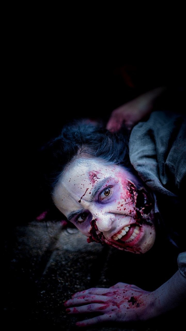 blood, halloween, horror, spooky, fear, darkness, zombie, celebration, evil, death, stage make-up, dark, monster - fictional character, make-up, shock, one person, portrait, wound, surprise, indoors, adult, physical injury, pain, looking at camera, emotion, dirt, black background, mystery, human blood, red, men, night, human face, terrified, headshot, costume, violence, aggression, child, dressing up