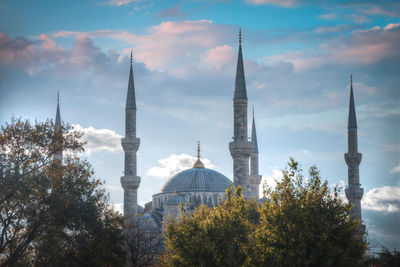 Low angle view of mosque against sky