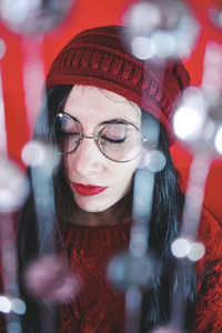 Portrait of young woman in hat