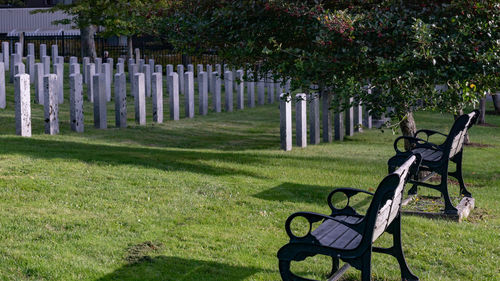 Empty bench in military cemetery 