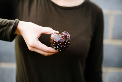 Close-up of woman holding ice cream