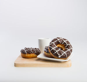 Close-up of chocolate cake against white background
