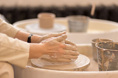 Midsection of woman preparing food