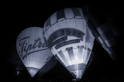 Low angle view of hot air balloon at night