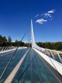 View of bridge against blue sky