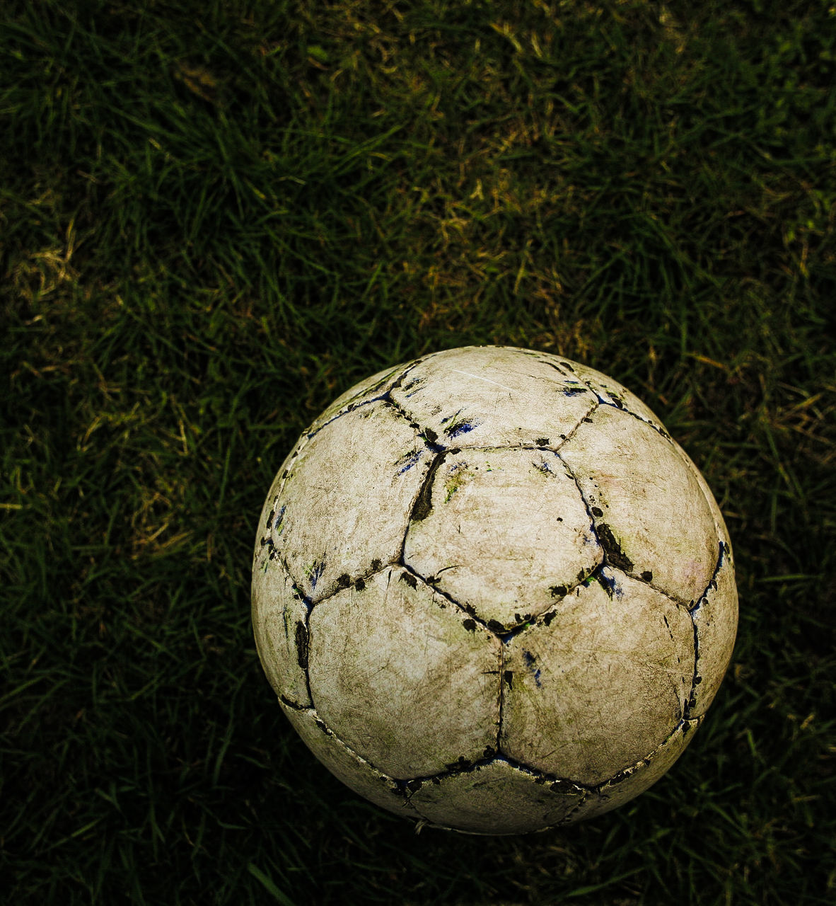 CLOSE-UP OF BALL ON FIELD