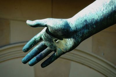 Close-up of hand statue
