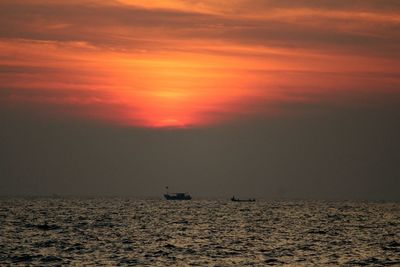 Scenic view of dramatic sky during sunset