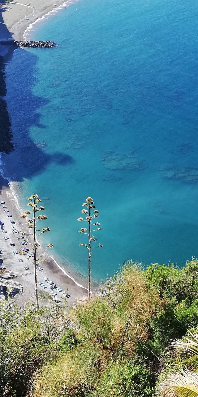 HIGH ANGLE VIEW OF SWIMMING POOL AT SEA