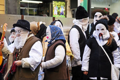 People at market stall