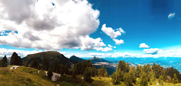 Panoramic view of landscape against cloudy sky
