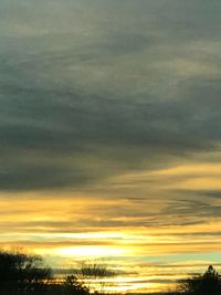 Low angle view of dramatic sky during sunset