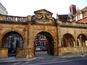 Facade of historic building against sky