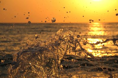 Scenic view of sea at sunset