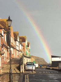 View of rainbow over city