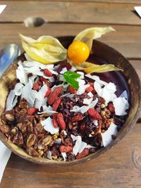 High angle view of chopped fruits in bowl on table