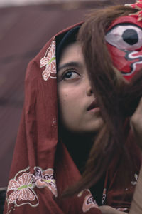 Close-up portrait of young woman