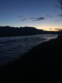 Scenic view of sea against clear sky during sunset