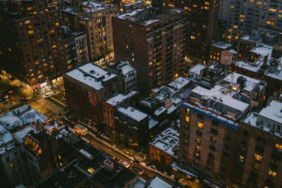 High angle view of city buildings at night