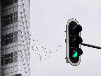 Low angle view of street light against clear sky