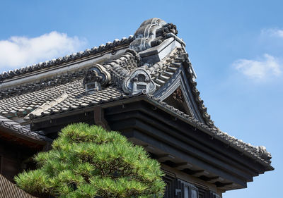 Low angle view of historic japanese building against sky