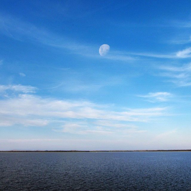 sea, water, tranquil scene, scenics, tranquility, waterfront, horizon over water, beauty in nature, sky, blue, nature, idyllic, cloud - sky, cloud, seascape, rippled, outdoors, calm, no people, day