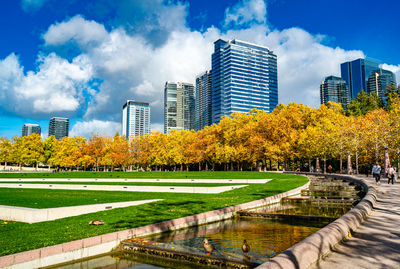 Buildings in city against sky
