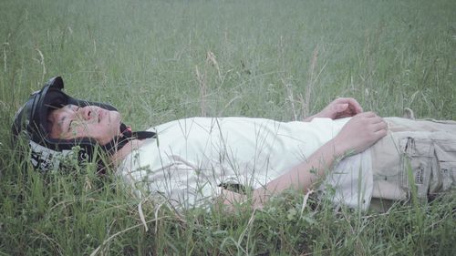 Man lying down on land