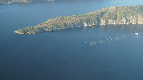 Scenic view of lake against blue sky