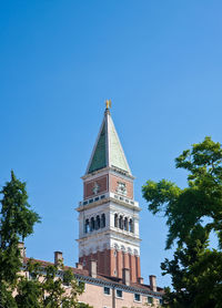 Low angle view of building against blue sky