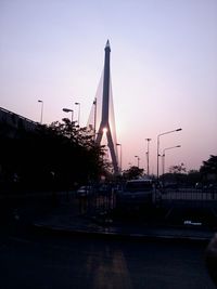 Cars on road at sunset