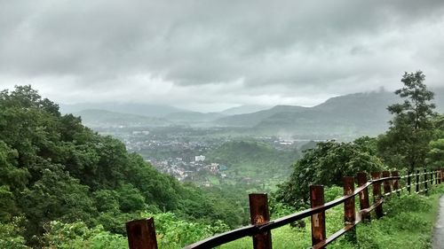 Scenic view of landscape and mountains against sky