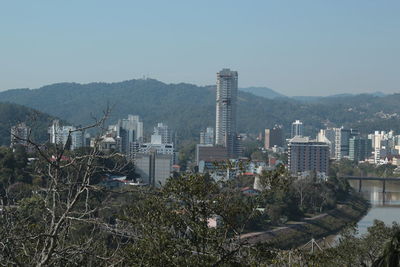 Cityscape against clear sky