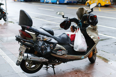 Side view of motor scooter on street