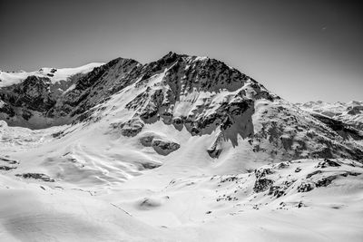 Scenic view of snowcapped mountain against sky