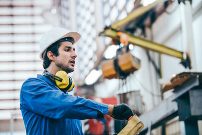 Side view of a man working