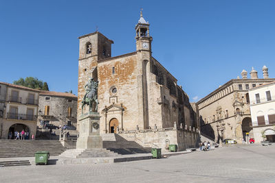 Low angle view of cathedral against clear blue sky