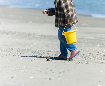 Woman standing on beach