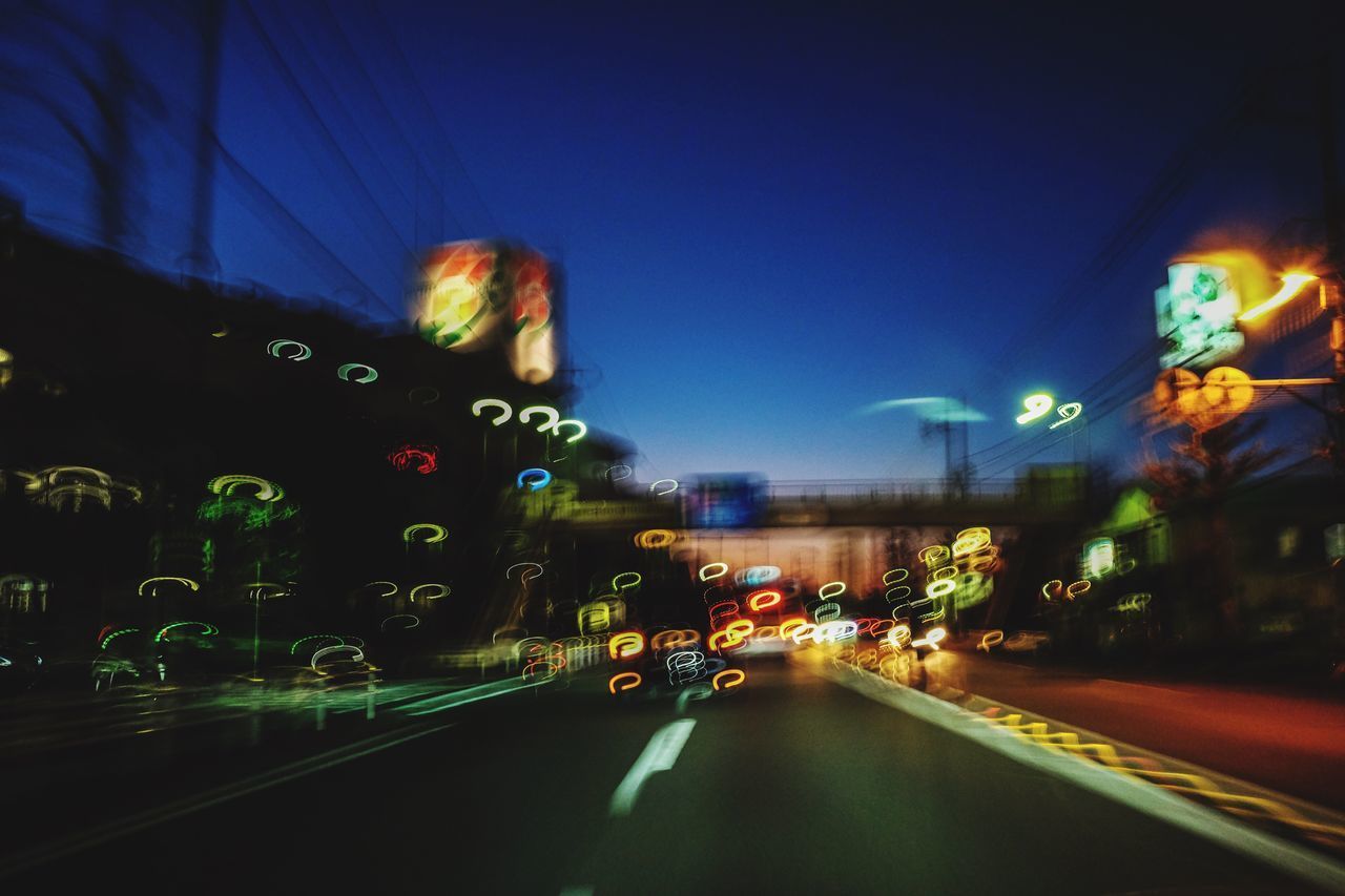 TRAFFIC IN CITY AT NIGHT