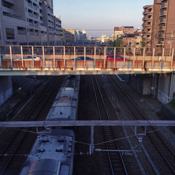 High angle view of train against buildings in city