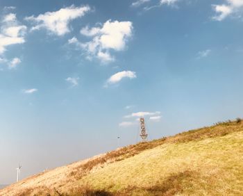 Low angle view of hill against sky